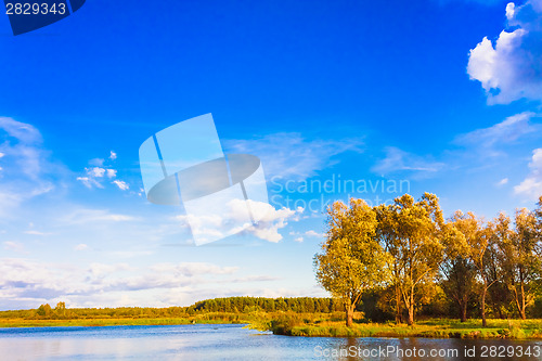 Image of Landscape With River And Blue Sky