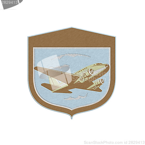 Image of Metallic DC10 Propeller Airplane Flying Shield Retro