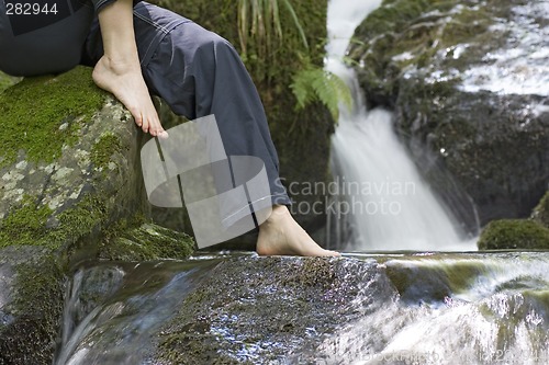 Image of Sitting by a waterfall