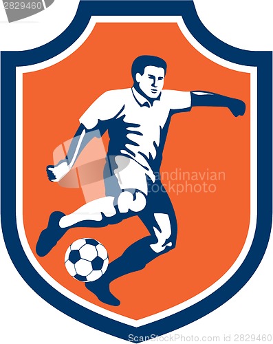 Image of Soccer Player Kicking Ball Shield Retro