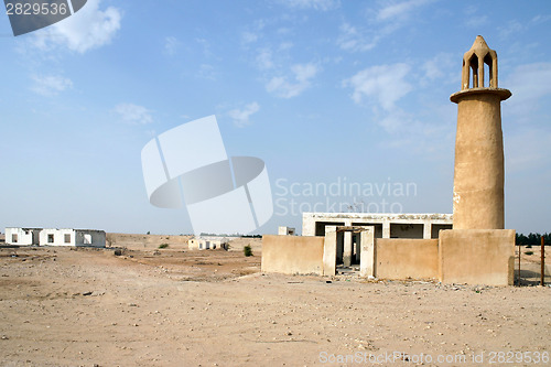 Image of Abandoned mosque and houses