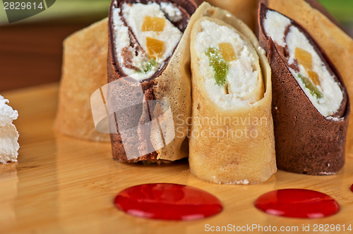 Image of pancake roll with marmalade