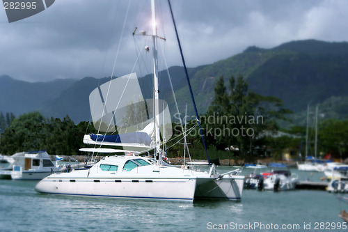 Image of Sailing Yacht and Coming Storm
