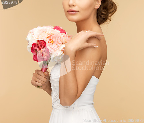 Image of woman with bouquet of flowers