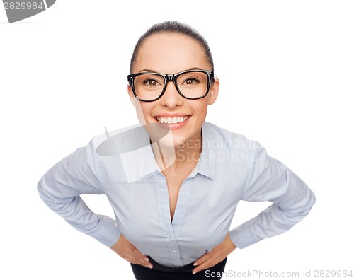 Image of smiling businesswoman in eyeglasses