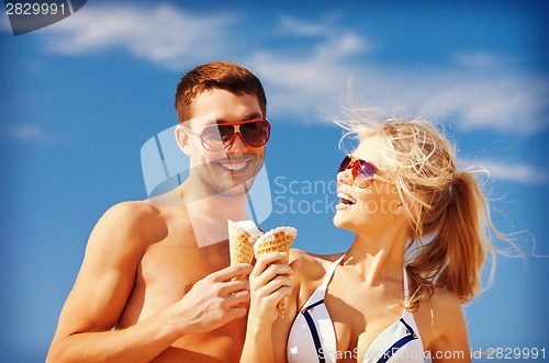 Image of happy couple with ice cream
