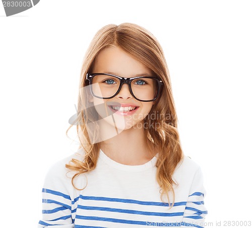 Image of smiling cute little girl with black eyeglasses