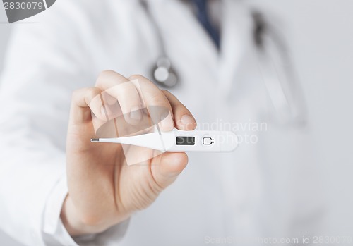 Image of male doctor with thermometer