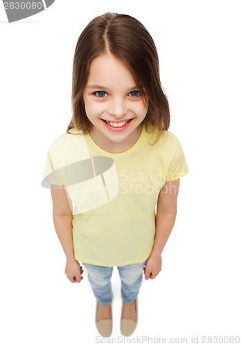 Image of smiling little girl over white background