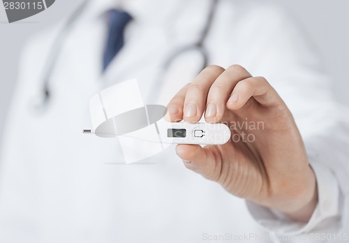 Image of male doctor with thermometer