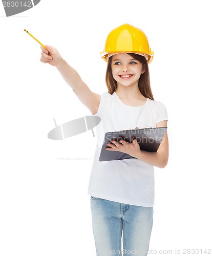 Image of little girl in protective helmet with clipboard