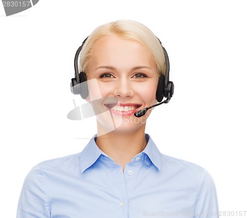 Image of friendly female helpline operator with headphones
