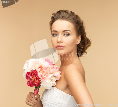 Image of woman with bouquet of flowers