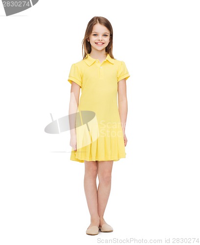 Image of smiling little girl in yellow dress