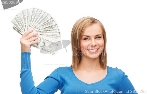 Image of smiling girl with dollar cash money