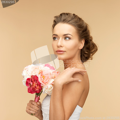 Image of woman with bouquet of flowers