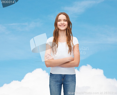 Image of smiling teenager in blank white t-shirt