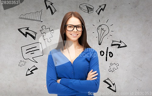 Image of smiling businesswoman or student in glasses