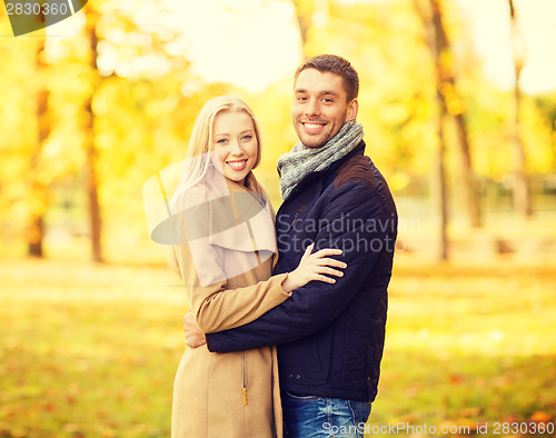 Image of romantic couple in the autumn park