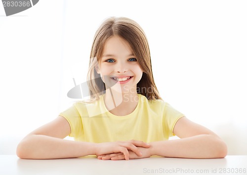 Image of beautiful little girl at home
