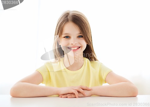 Image of beautiful little girl at home