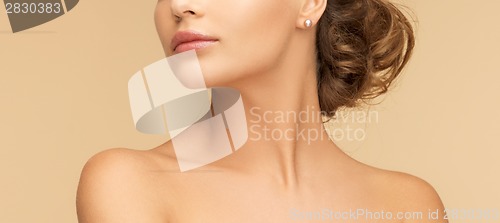 Image of beautiful woman with pearl earrings