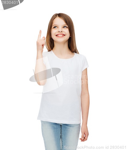 Image of smiling little girl in white blank t-shirt