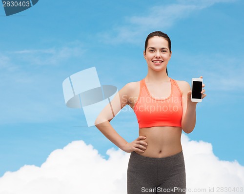 Image of sporty woman with smartphone