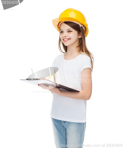 Image of smiling little girl in protective helmet