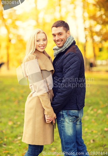 Image of romantic couple in the autumn park
