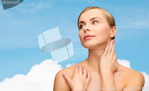 Image of face and hands of beautiful woman
