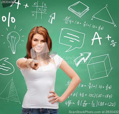 Image of teenager in blank white t-shirt pointing at you