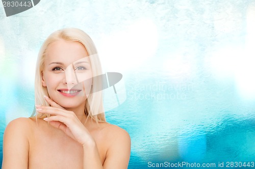 Image of face and hands of beautiful woman