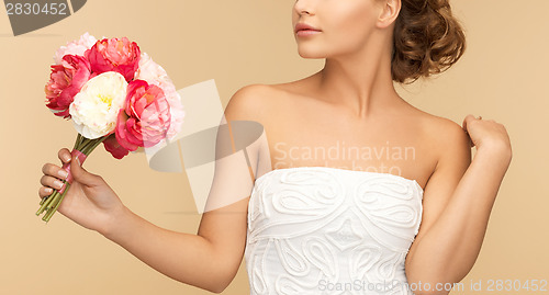 Image of woman with bouquet of flowers