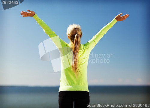 Image of woman doing sports outdoors