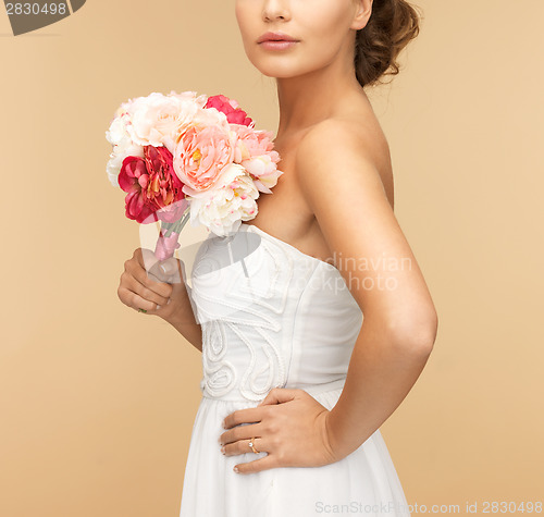 Image of woman with bouquet of flowers