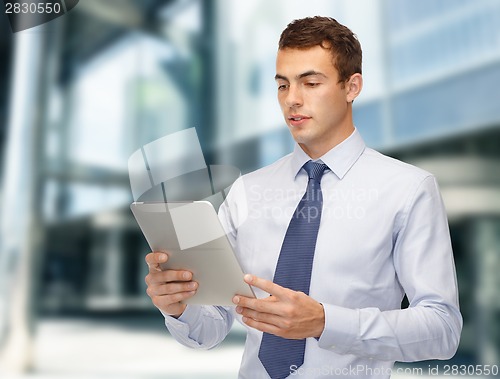 Image of businessman with tablet pc