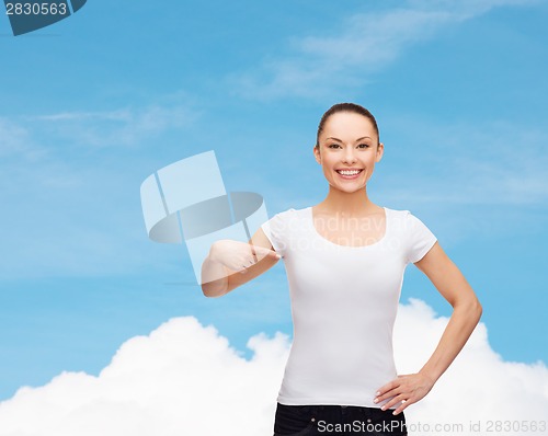 Image of smiling woman in blank white t-shirt