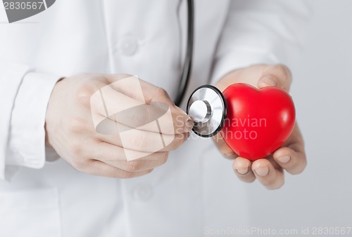 Image of man hands with heart