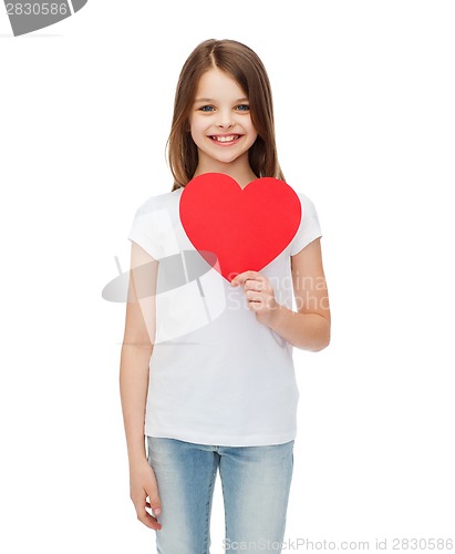 Image of smiling little girl with red heart