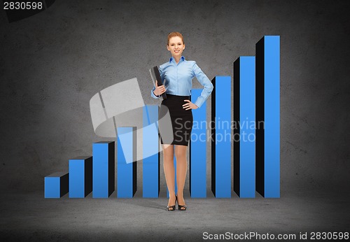 Image of smiling businesswoman with folder