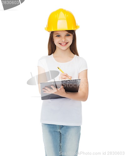 Image of smiling little girl in protective helmet