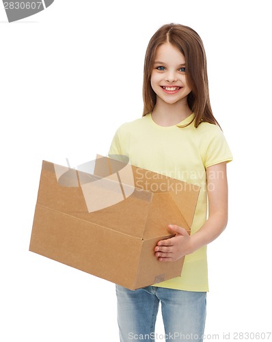 Image of smiling little girl with many cardboard boxes