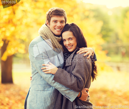 Image of romantic couple in the autumn park