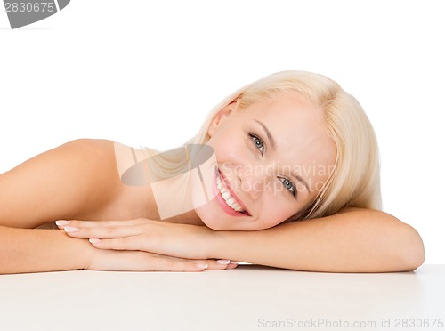 Image of clean face and shoulders of beautiful young woman