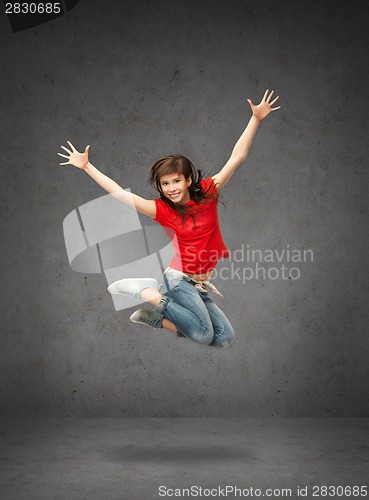 Image of happy jumping teenage girl