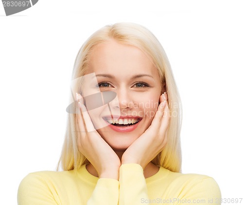 Image of face of happy young woman