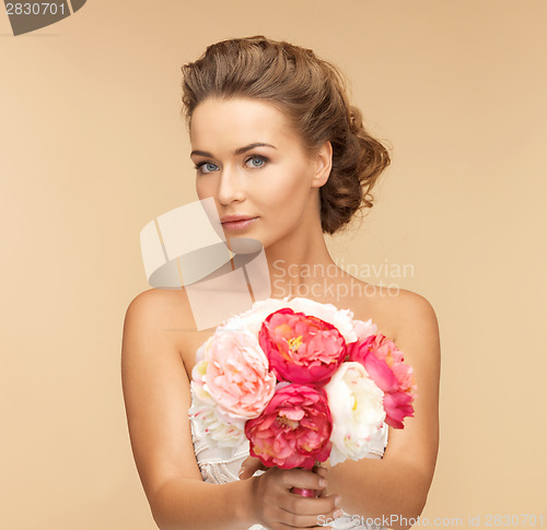 Image of woman with bouquet of flowers