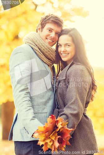 Image of romantic couple in the autumn park