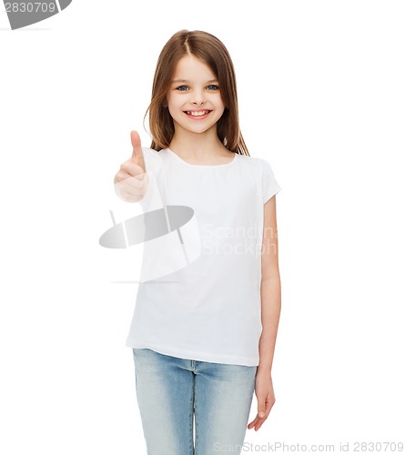 Image of little girl in blank white tshirt showing thumbsup